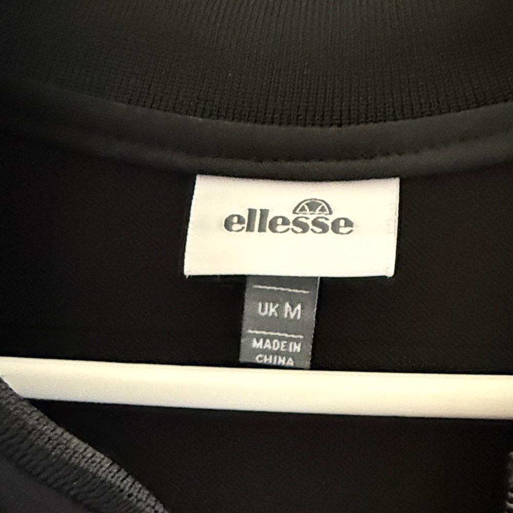 Ellesse Black Jacket with Vibrant Stripes - Picture 2 of 3